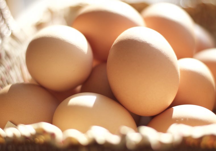 Brown eggs in a brown basket